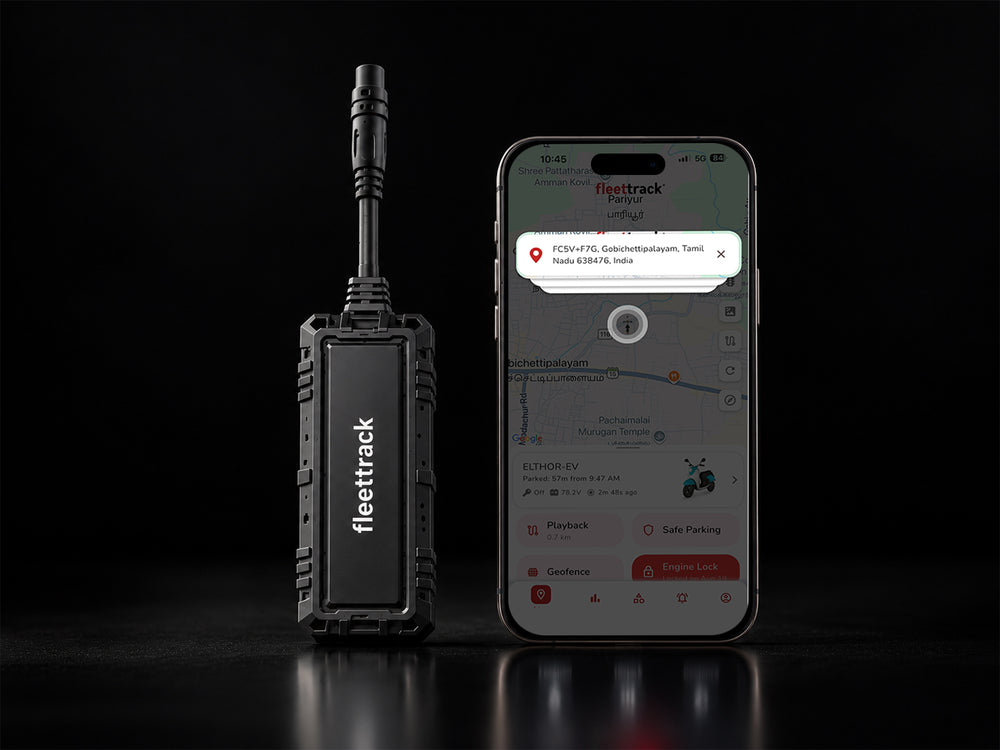 Fleettrack GPS tracker installed in a car's OBD port for real-time vehicle tracking
